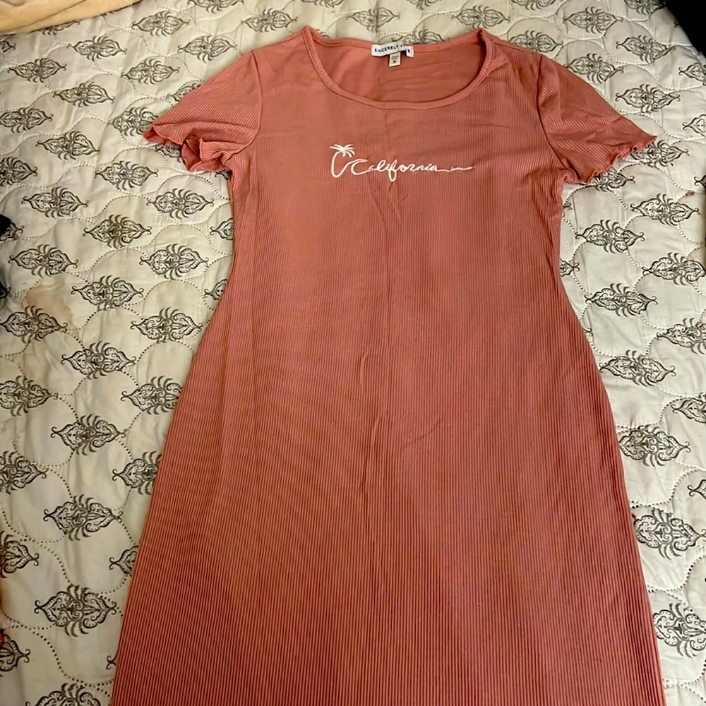 Short over-the-knee pink summer dress